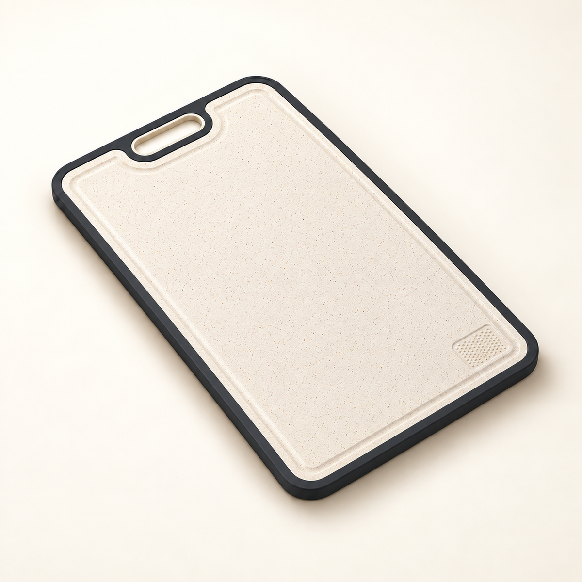 Cream-speckled reverse of the cutting board with perimeter groove and small grinding area.