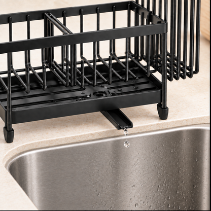 Sink caddy rotating drainage spout detail.